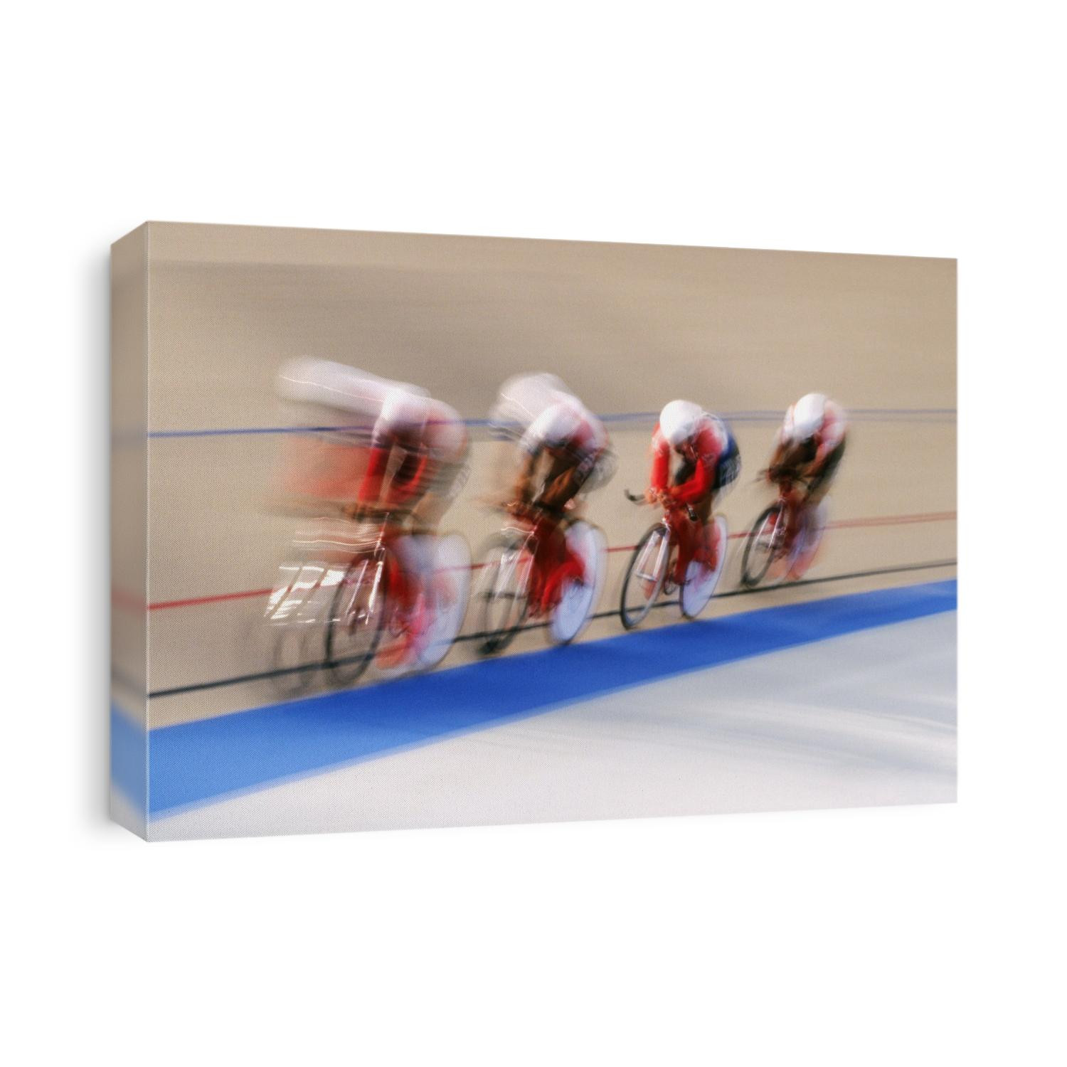 Blurred action of cycliing team onthe track.
