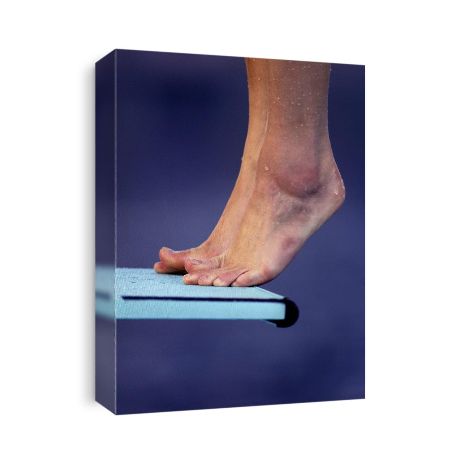 Detail of divers feet on the diving board.