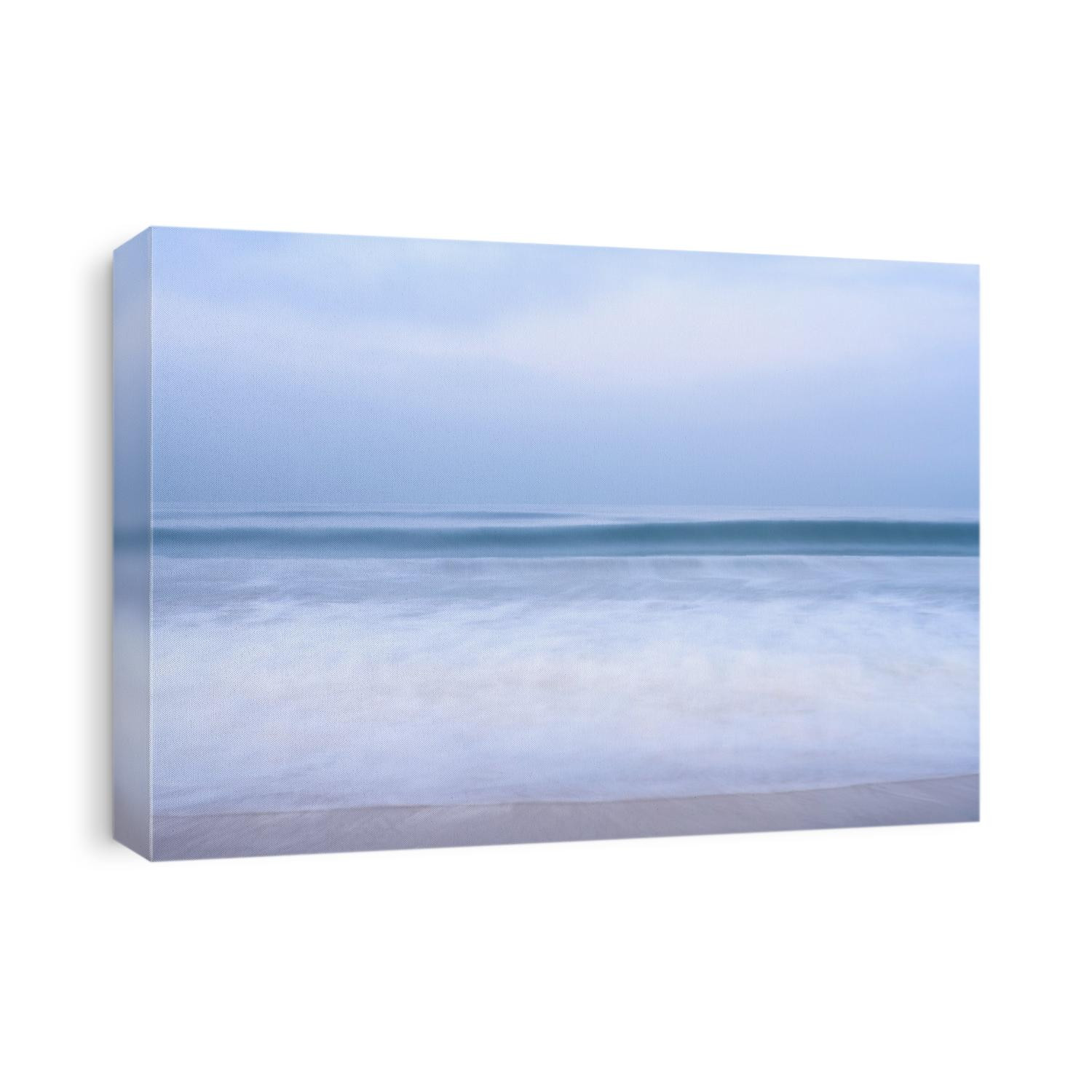 A long exposure photograph of a wave during a quiet morning