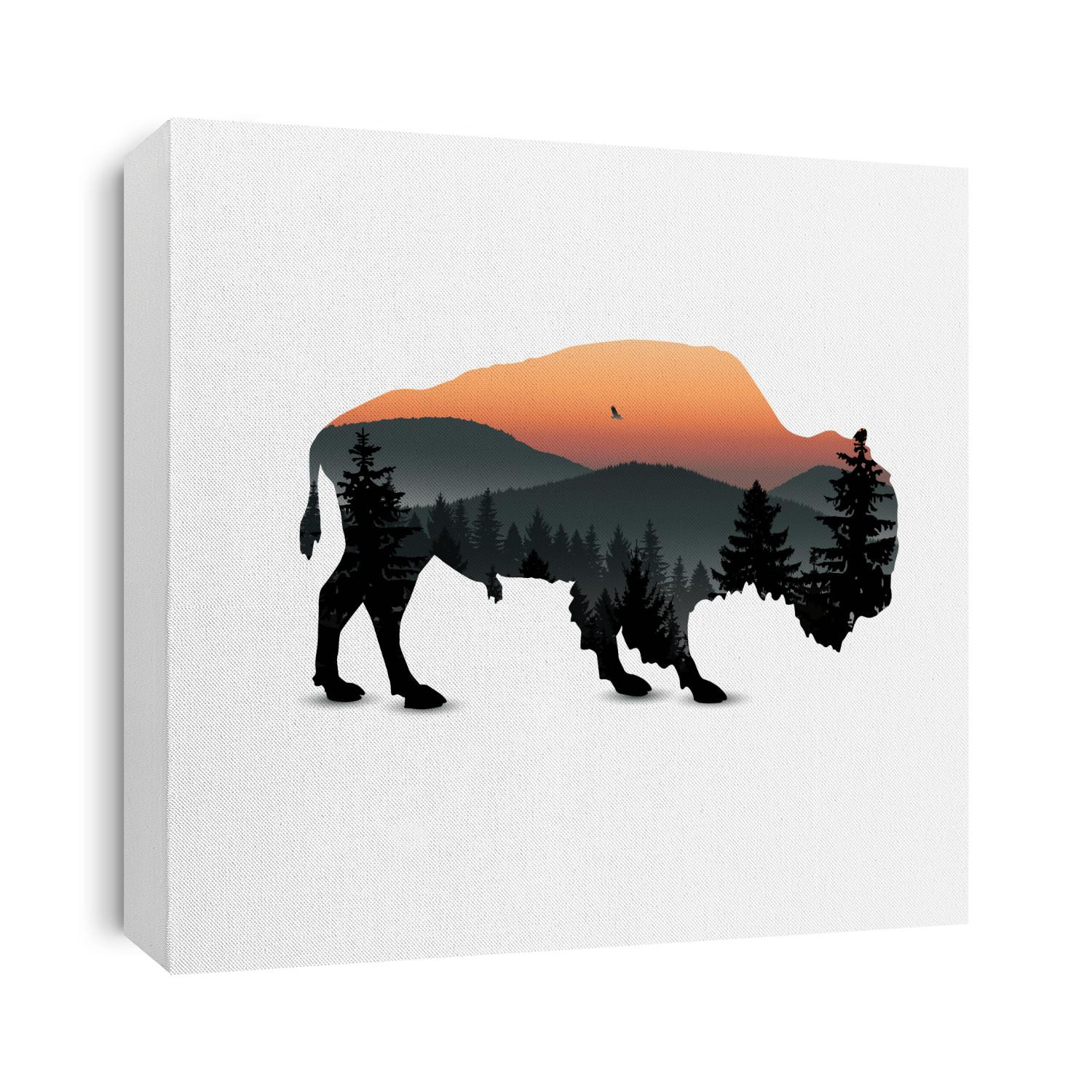 Silhouette of bison with mountain landscape.