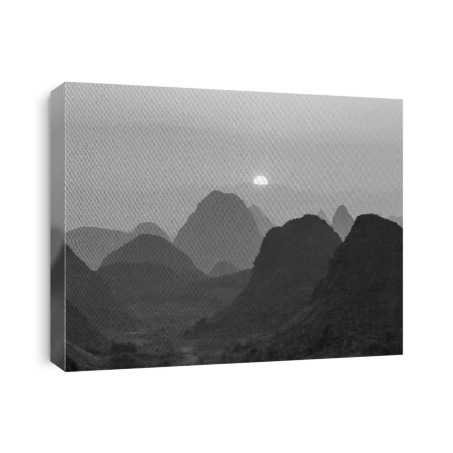 Beautiful sunset. The view from the top of the Vine Mountains near Guilin - China (black and white)