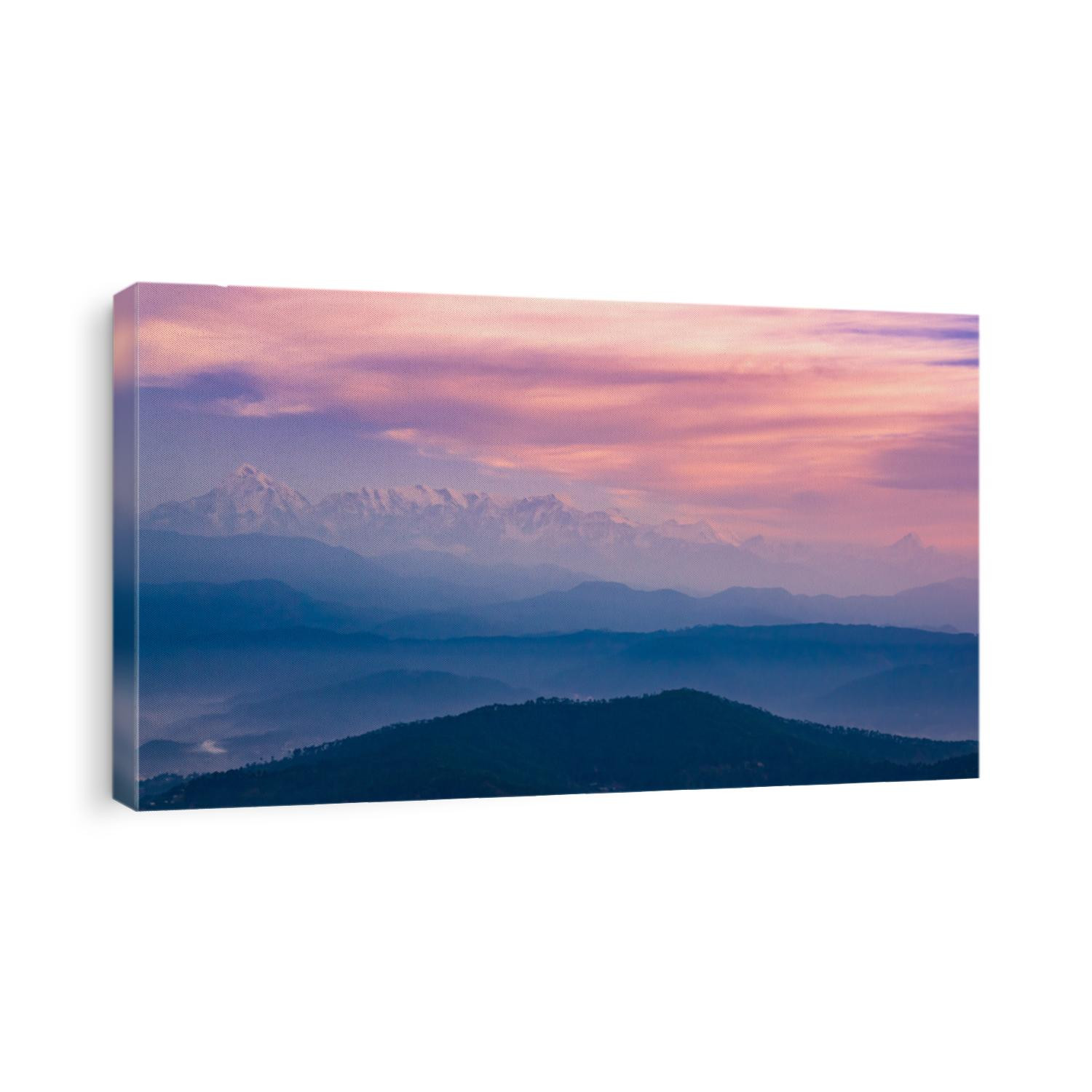 Panoramic landscape of great Himalayas mountain range during an autumn morning from Kausani also known as 'Switzerland of India' a hill station in Bageshwar district, Uttarakhand, India.