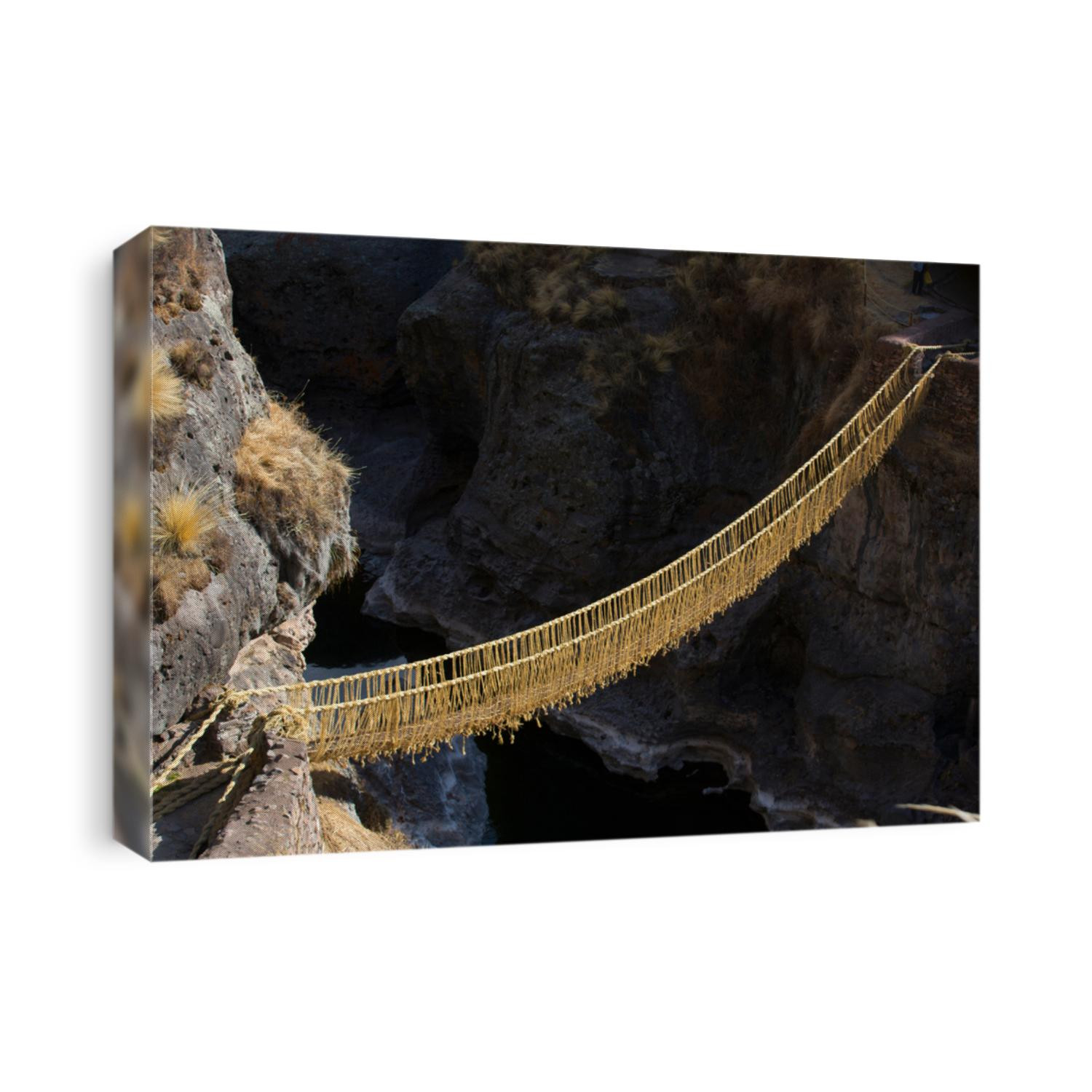 Queswachoca ancient rope bridge in the Andes