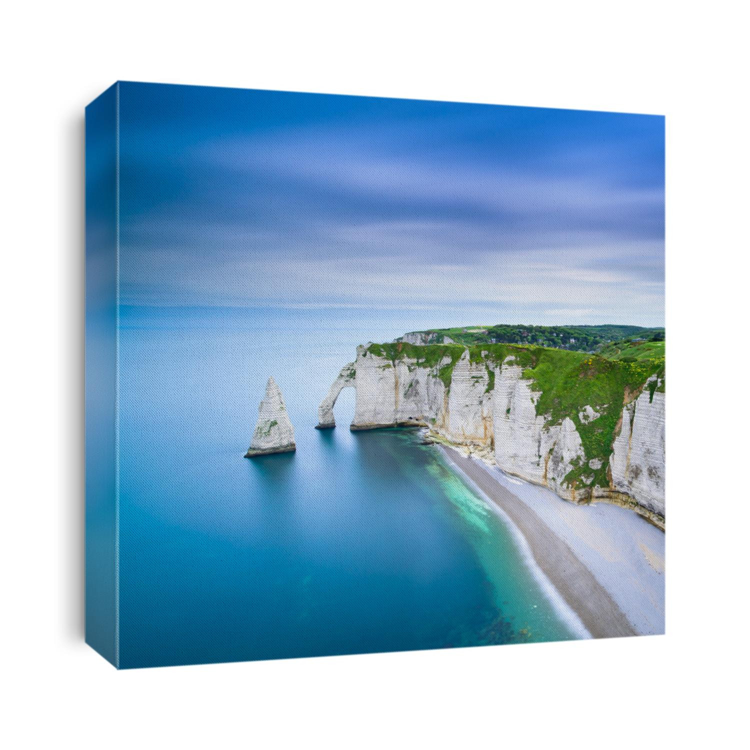 Etretat Aval cliff, rocks and natural arch landmark and blue ocean. Aerial view. Normandy, France, Europe.