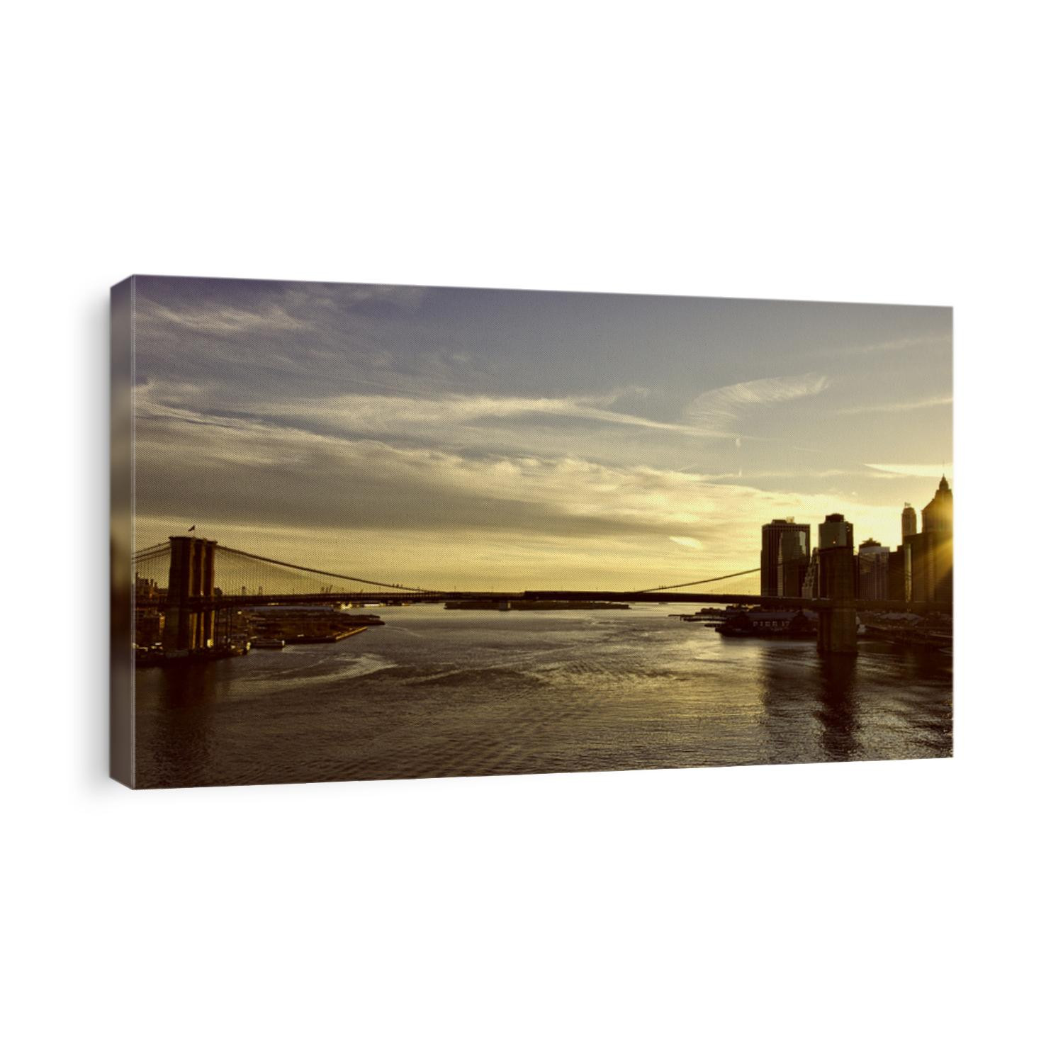 Brooklyn Bridge with sunset over Manhattan