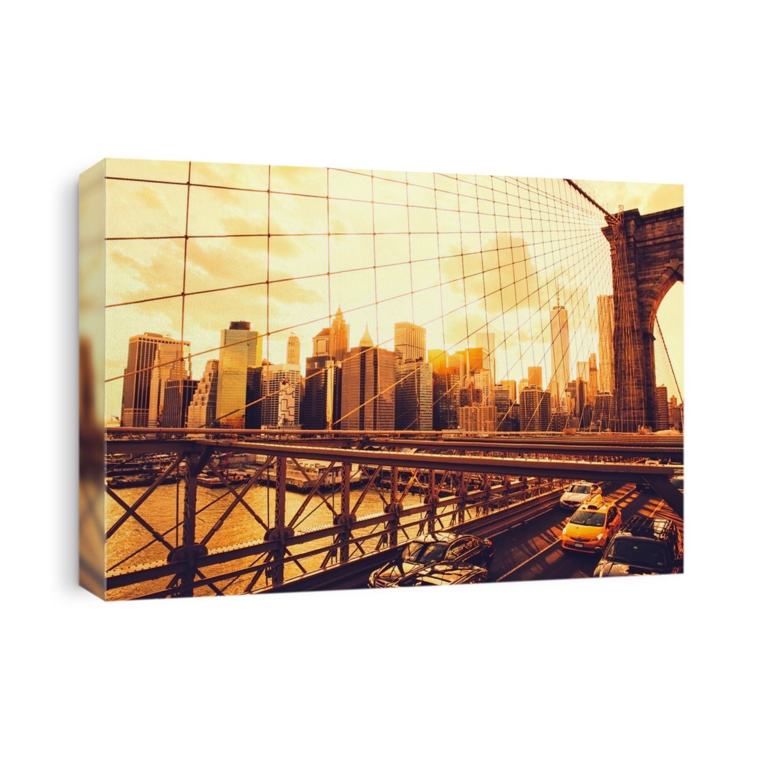 New York,Brooklyn Bridge and Manhattan Skyline at sunset