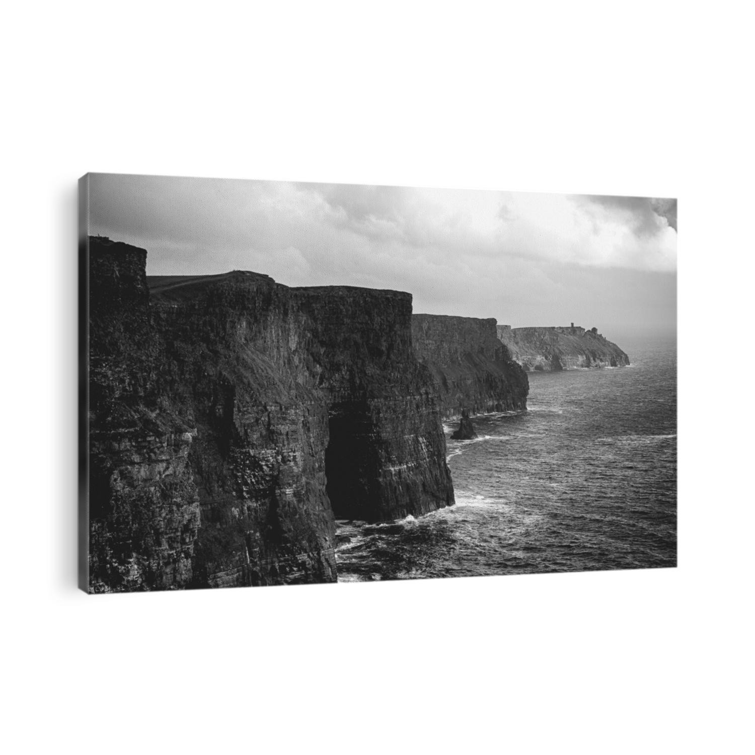 Black and white picture of the world famous cliffs of moher in county ireland. beautiful scenic irish countryside along the wild atlantic way.