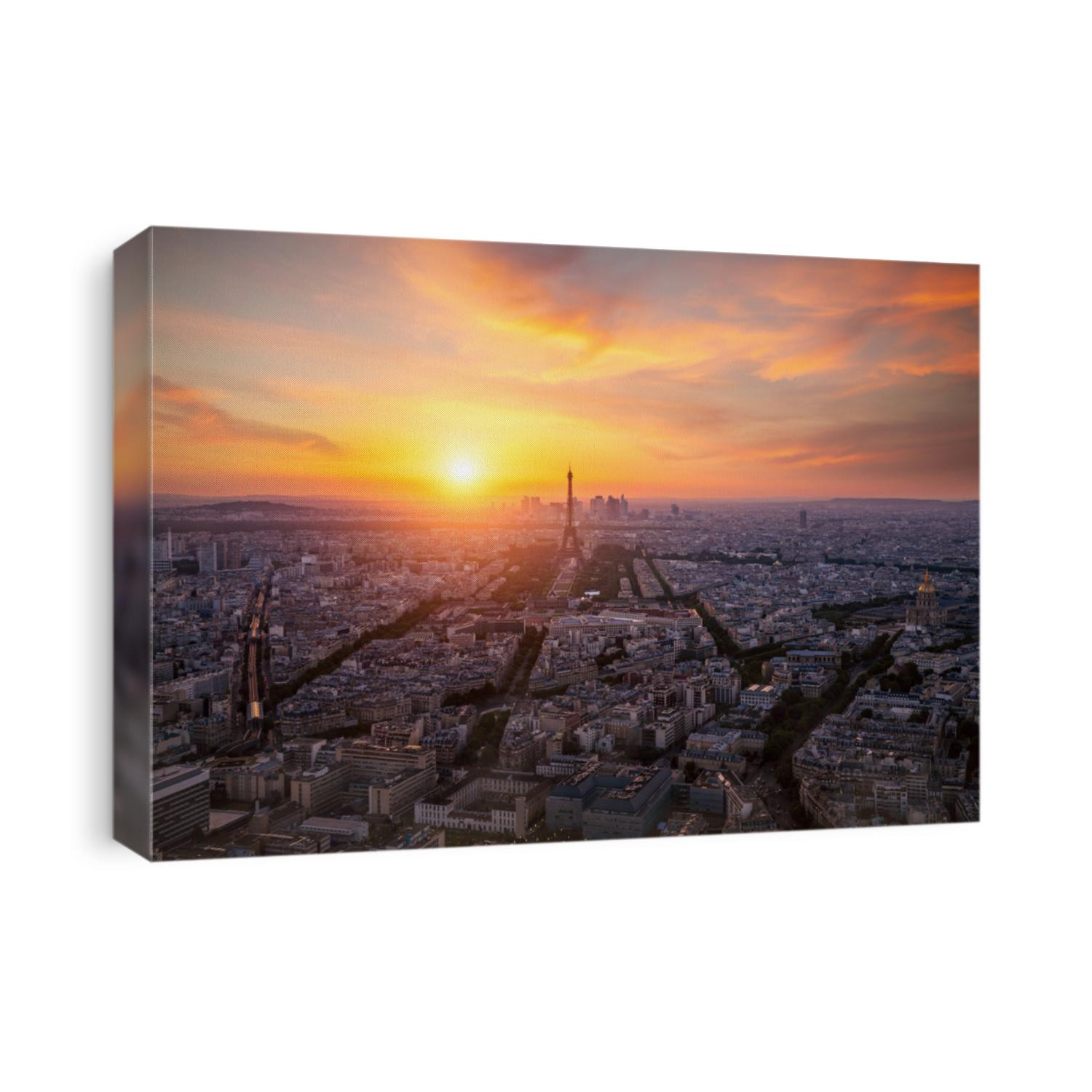 Aerial view, from Montparnasse tower at sunset and night sky, view of the Eiffel Tower and La Defense district in Paris, France