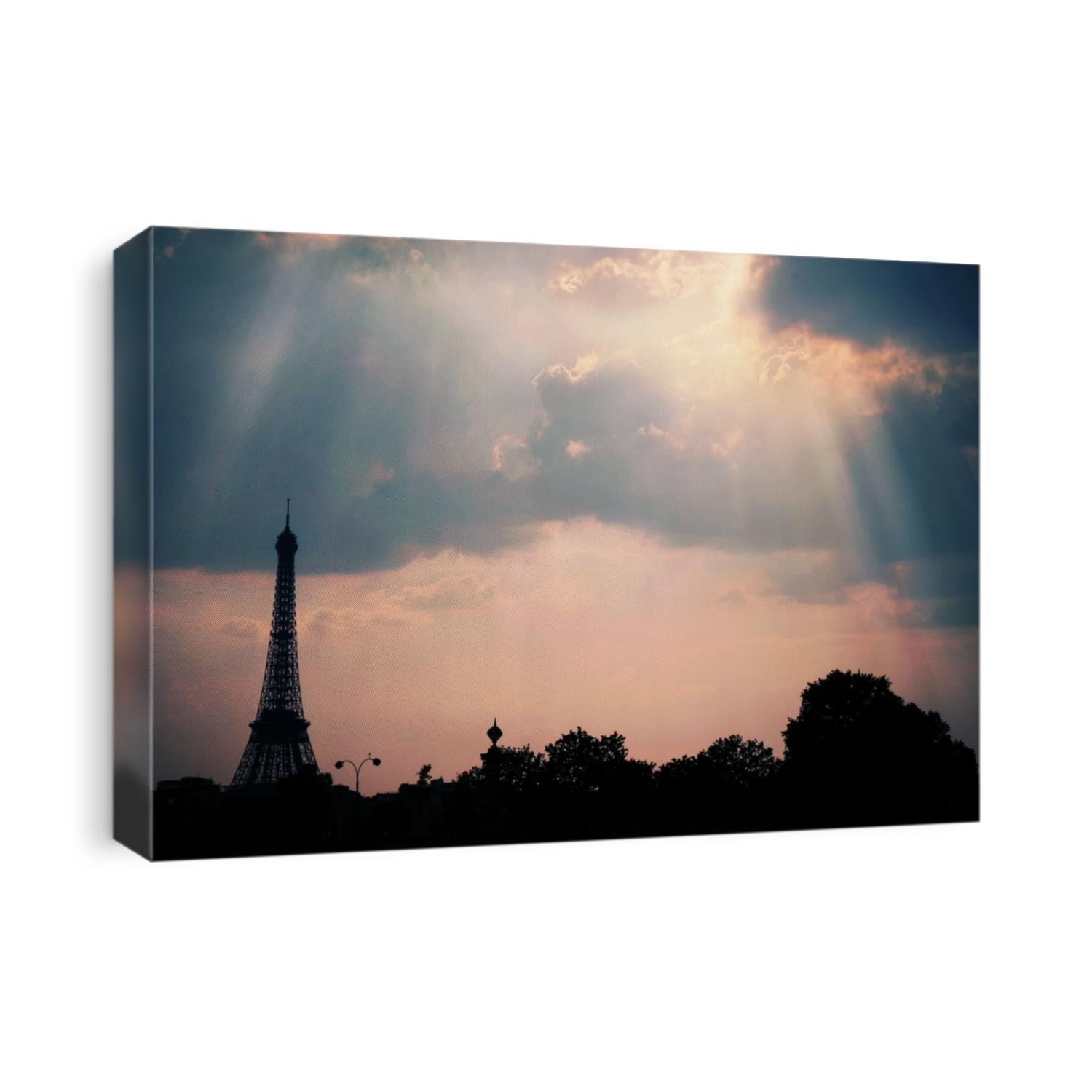 Sunset in Paris. View of the Eifell Tower from Place de la Concorde.


