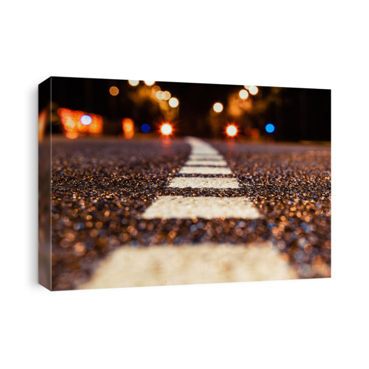 asphalt road leading into the city at night. Selective focus. background
