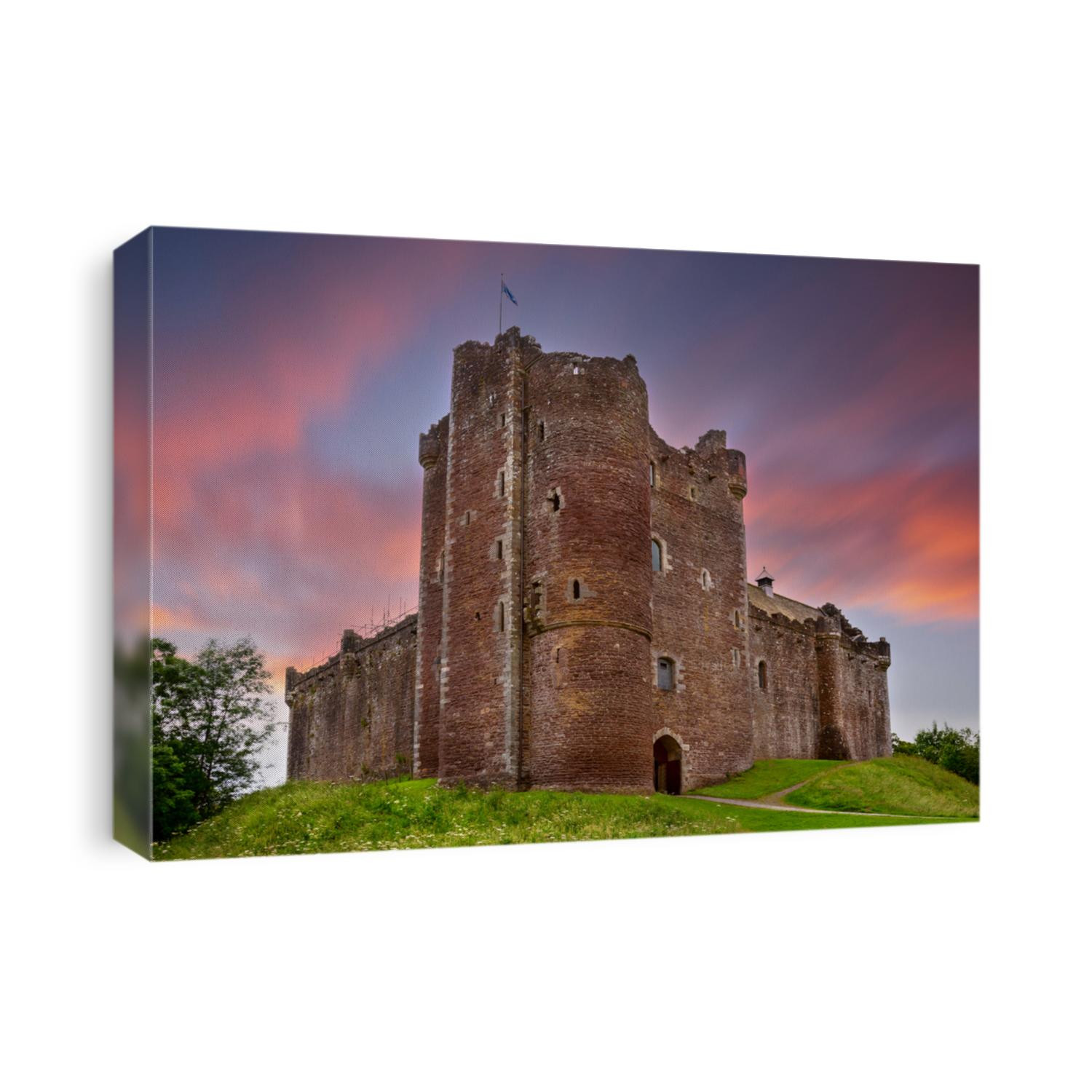 Sunset over Doune Castle in the Stirling district, Scotland. It is a medieval courtyard fortress built around 1400 by Robert Stewart, Duke of Albany, Regent of Scotland.