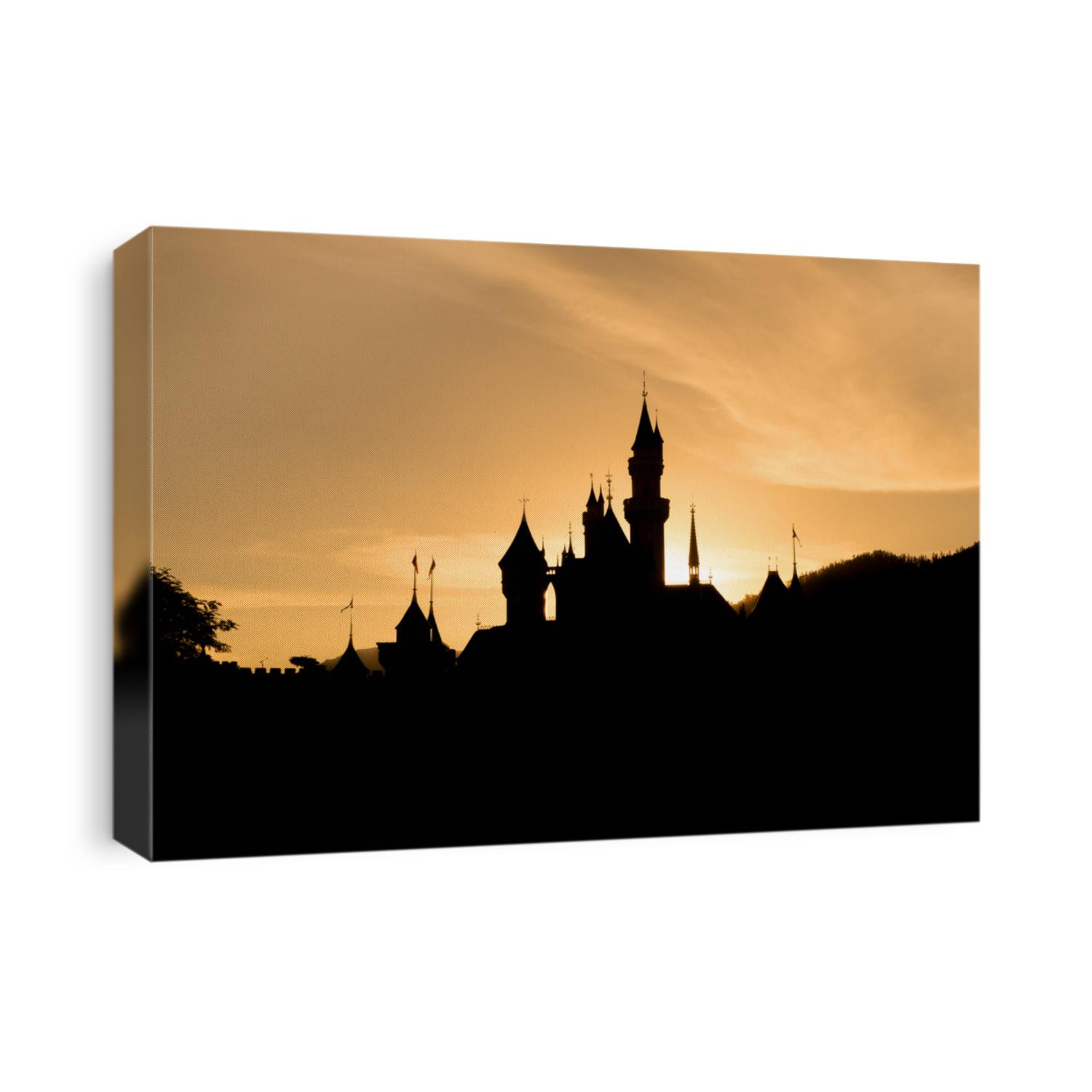 silhouette of castle with sunset sky.