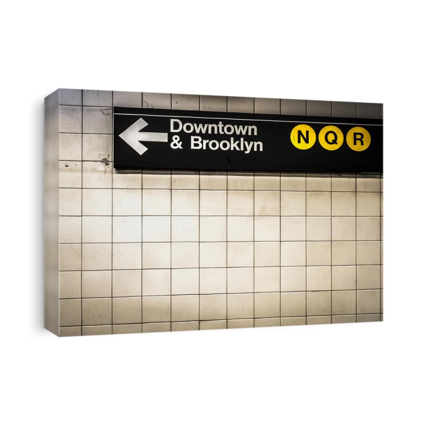Subway sign in Manhattan directing passengers and travelers to the downtown and Brooklyn trains