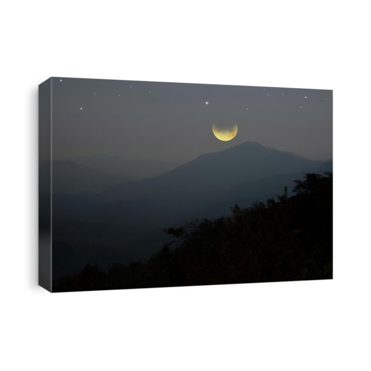 Beautiful wanning moon over the mountain