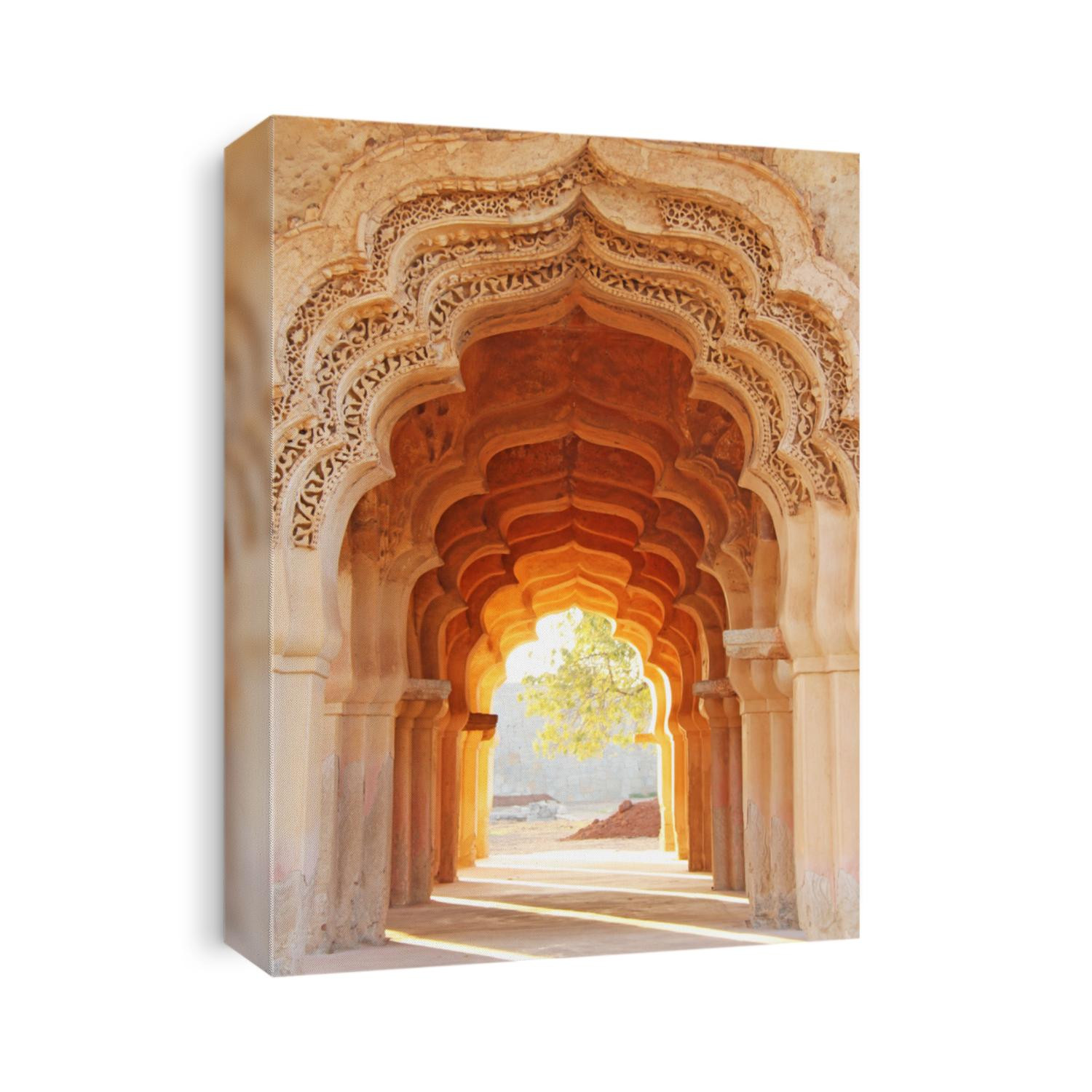 Lotus Mahal Temple in Hampi, Karnataka, India. Beautiful carved stone arch and sunset. A popular tourist route from the GOA state. Beautiful hindu temple.