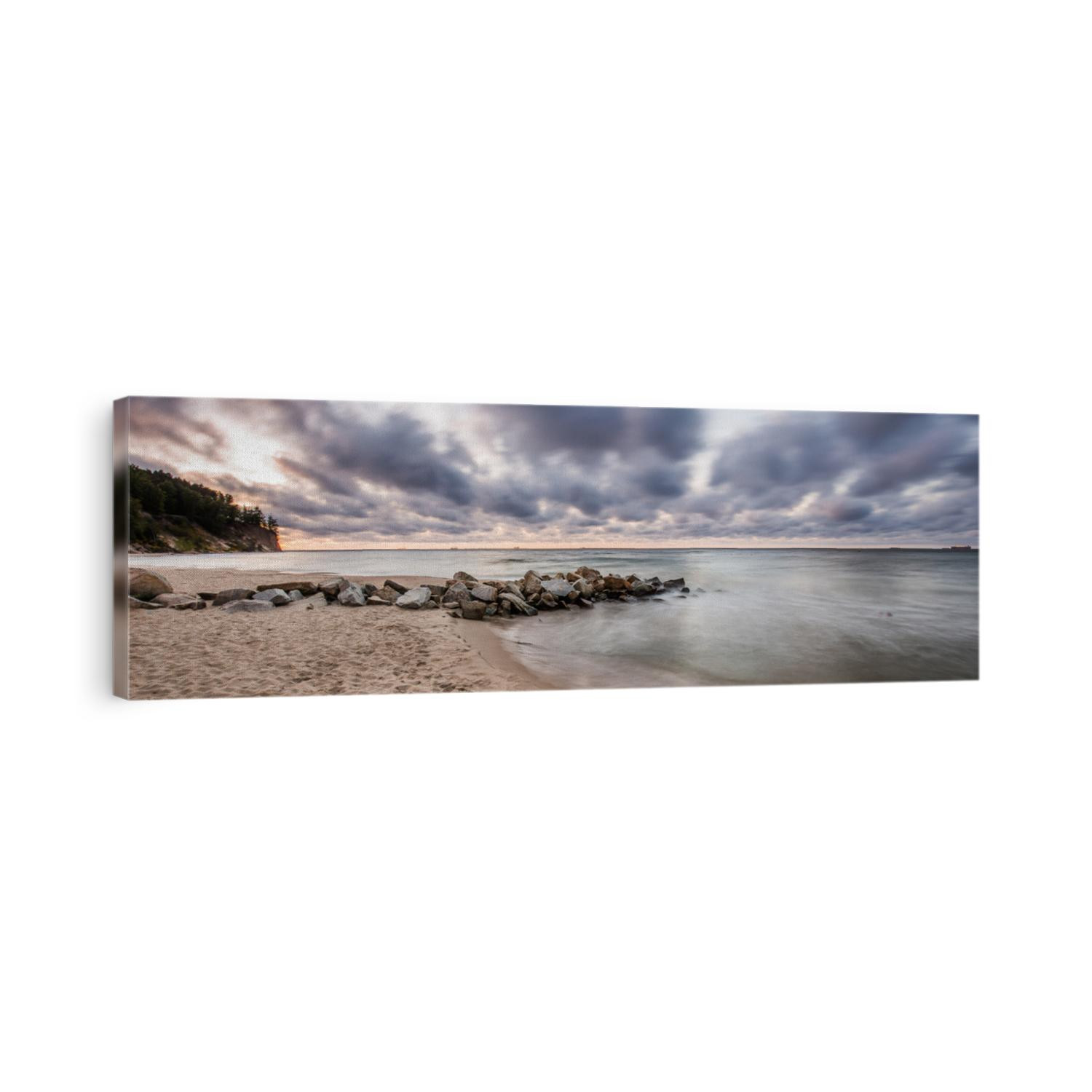 Stormy sunrise over the baltic sea in Gdynia Orlowo, Poland. Widescreen(panoramic) banner of vacations landscape.
