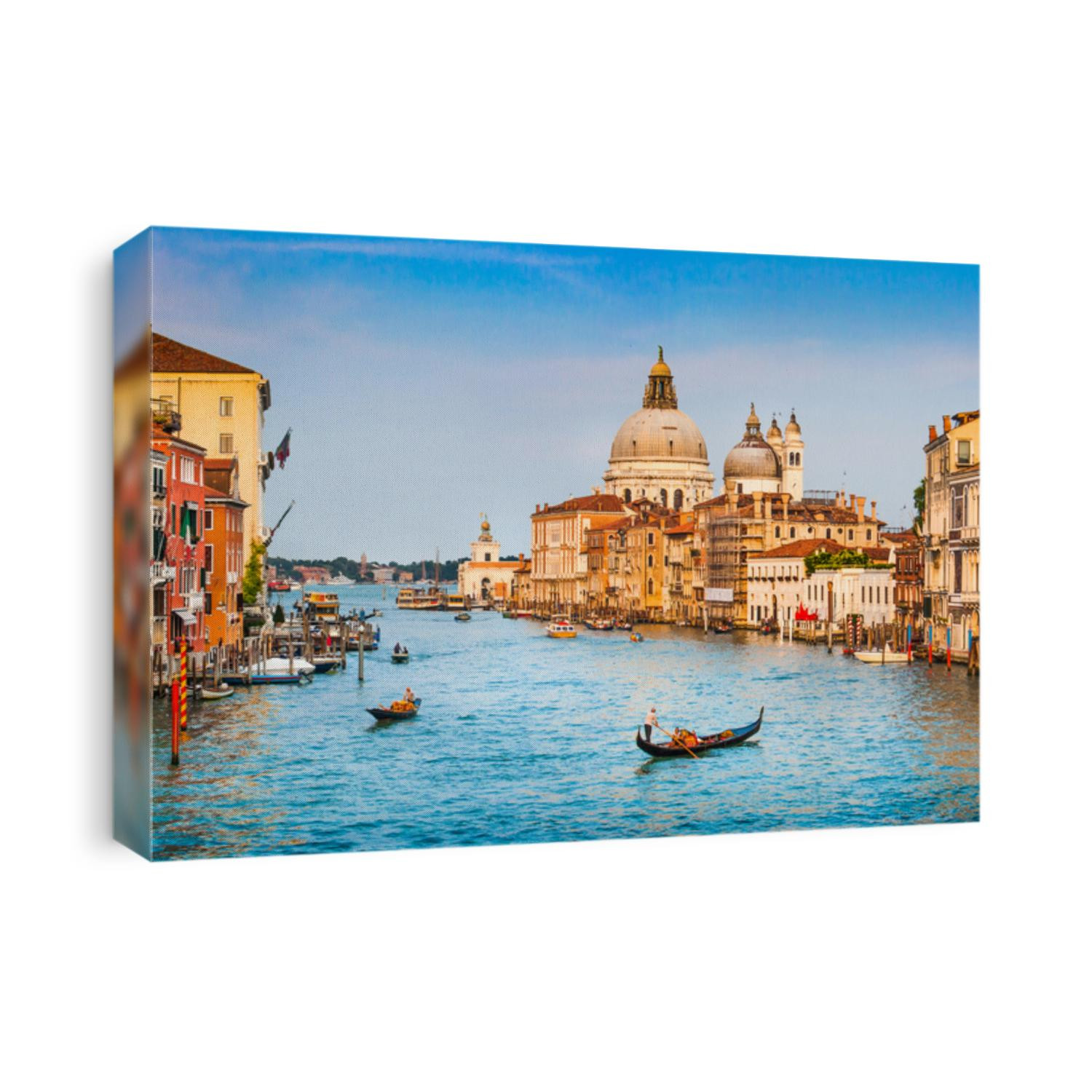 Panoramic view of famous Canal Grande and Basilica di Santa Maria della Salute at sunset in Venice, Italy