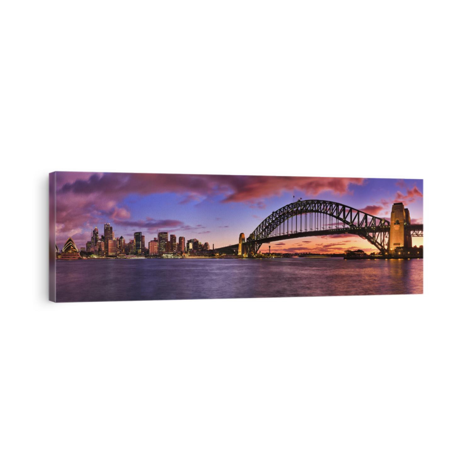burning bright sunset over Sydney CBD cityline pictured panoramic across Harbour including skyscrapers and harbour bridge